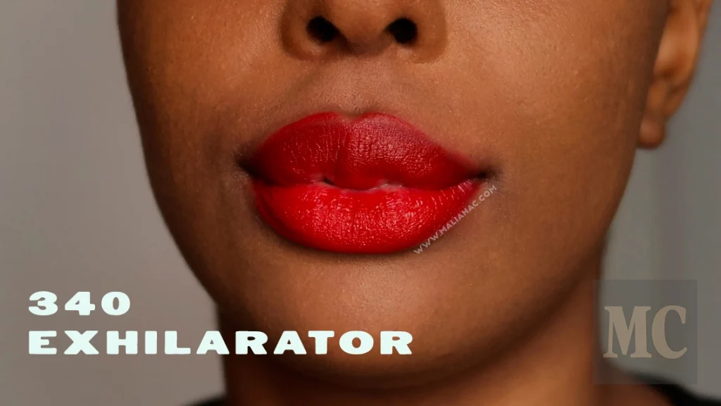 Swatch of Maybelline Superstay Matte Ink in the shade Exhilarator on dark skin